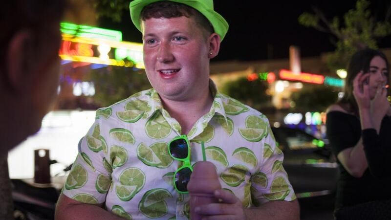 Santa Ponsa: Alex Dunne from Trim, with novelty drinking vessel, at the Manhattan Bar. Photograph: Tomeu Coll