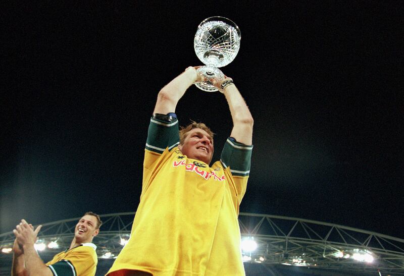 Justin Harrison of Australia with the Tom Richards Cup after the third and final Test between the British and Irish Lions and the Australian Wallabies in Sydney on July 14th, 2001. Photograph: Scott Barbour/Allsport
