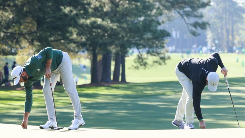 McIlroy played a practice round with Dustin Johnson on Monday. Photo: Justin Lane/EPA