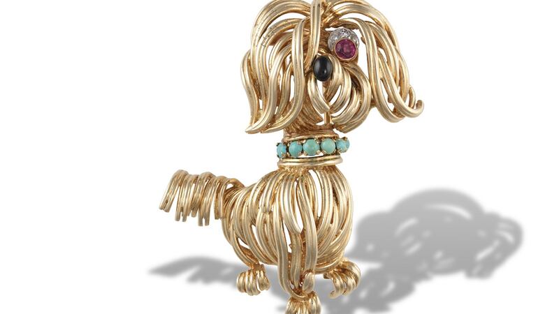 1960s dog brooch, collar set with cabuchon turquoises, nose of black onyx and one cheeky eye made from a ruby and diamonds. €900-€1,200