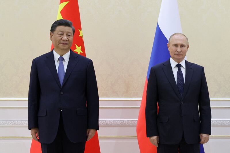 China's President Xi Jinping and Russian President Vladimir Putin pose  on the sidelines of the Shanghai Co-operation Organisation leaders' summit. Photograph: Alexandr Demyanchuk/Getty Images