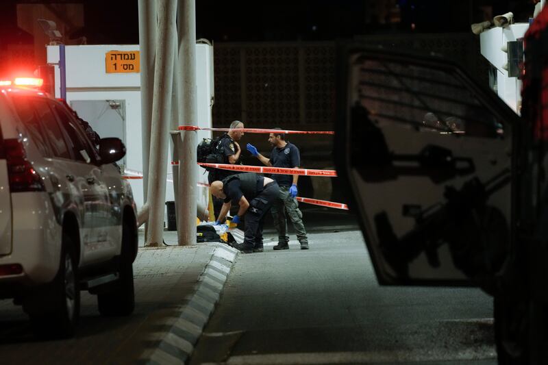 Israeli police examine the scene of a shooting attack near the Shuafat refugee camp in Jerusalem. Photograph: Mahmoud Illean/AP/PA