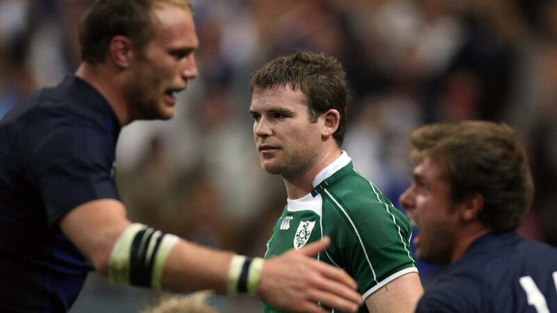 Ireland’s Gordon D’Arcy dejected as France’s Julien Bonnaire congratulates try-scorer Vincent Clerc during their World Cup group match in September 2007. Photograph: Billy Stickland