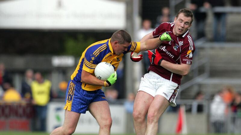 Roscommon’s Séamus O’Neill fends off Galway’s Barry Cullinane in the Connacht SFC quarter-final in 2008. Photograph:  James Crombie/Inpho