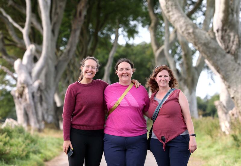 Carolyn Windler, Erica Fraser and Claire Gammon from Colorado pictured at the Dark Hedges avenue of beech trees. Photograph: Stephen Davison