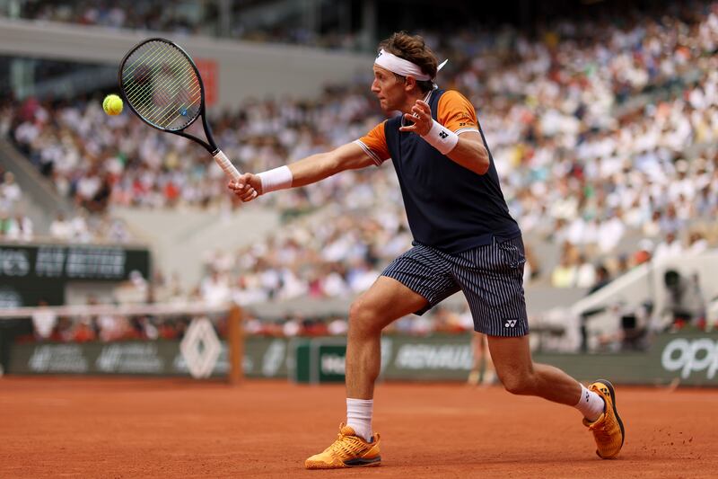 Casper Ruud plays a backhand. Photograph: Clive Brunskill/Getty Images