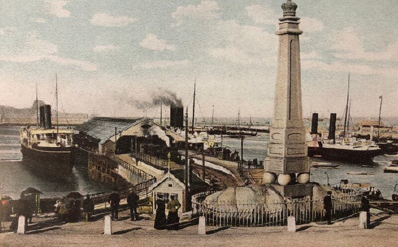 RMS Leinster: a bustling Kingstown harbour, as depicted in a picture postcard. Courtesy of An Post