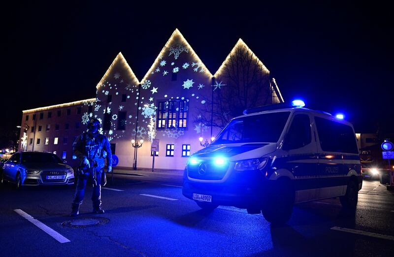 Police and ambulances next to the market in Magdeburg city centre. Photograph: John MacDougall/AFP via Getty Images