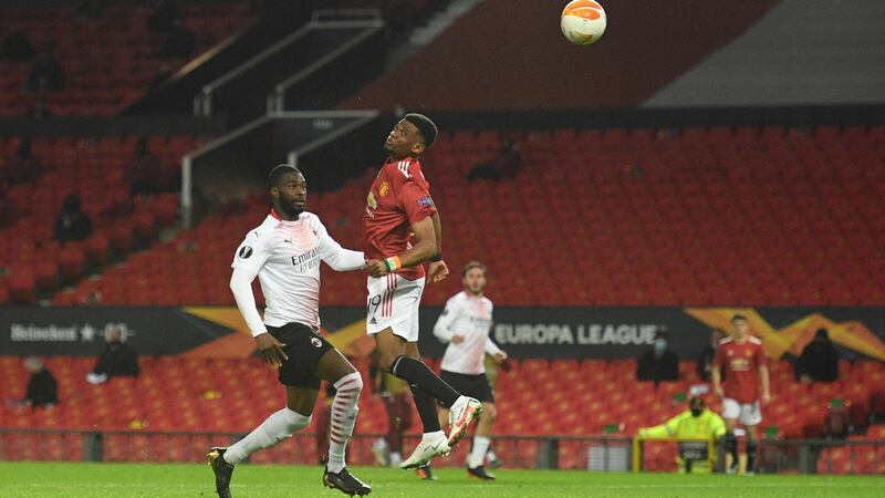 Manchester United’s  Amad Diallo heads home his side’s goal in the Europa League round of 16 first leg game against AC Milan at Old Trafford. Photograph: Oli Scarff/AFP via Getty Images