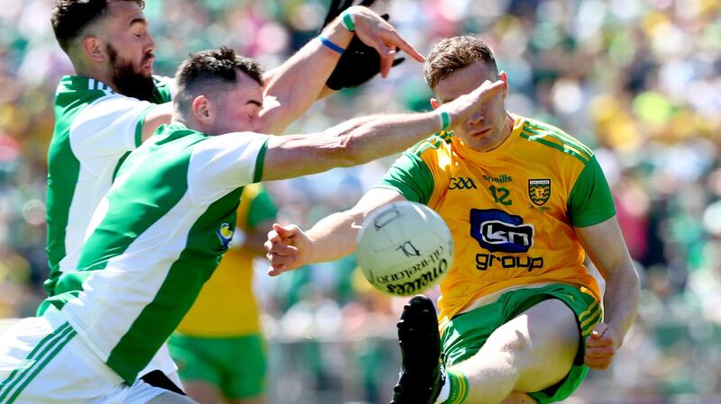 Fermanagh’s James McFadden and Barry Mulroe block Ciarán Thompson of Donegal during the Ulster SFC Final at  St Tiernach’s Park in Clones. Photograph: James Crombie/Inpho