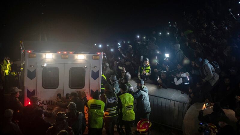 An ambulance leaves with the body of 5-year-old Rayan after it was retrieved. Photograph:Mosa’ab Elshamy/AP