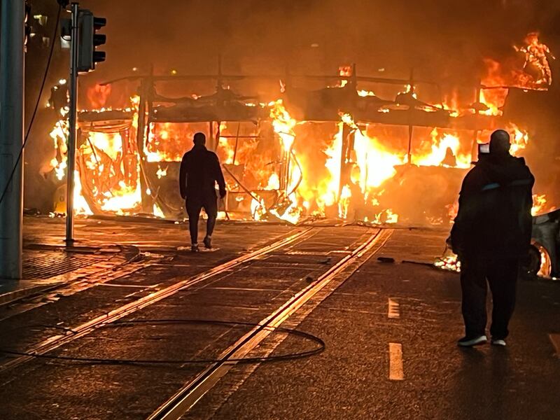 Public Order Unit and gardaí confront protestors on Dublin's O’Connell street in the aftermath of the Parnell Square knife attack. Photograph Alan Betson

