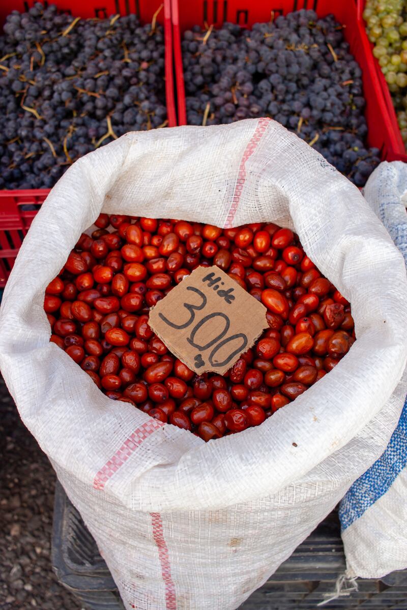 Hide: Albanian fruit that looks like an olive but tastes like an apple mixed with a date