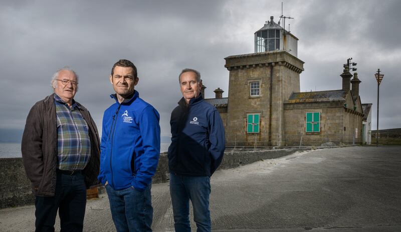 Gerry Sweeney, assistant attendant lighhouse keeper, with his son Fergus (Blacksod lighthouse tour guide) and brother Vincent, (attendant lighhouse keeper) at Blacksod lighthouse situated on the southern end of the Mullet Peninsula, Erris, Co Mayo. Photo: Michael McLaughlin