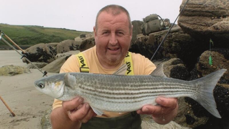 Ian Mulligan from Dublin with his record-breaking Rosscarbery golden grey mullet.