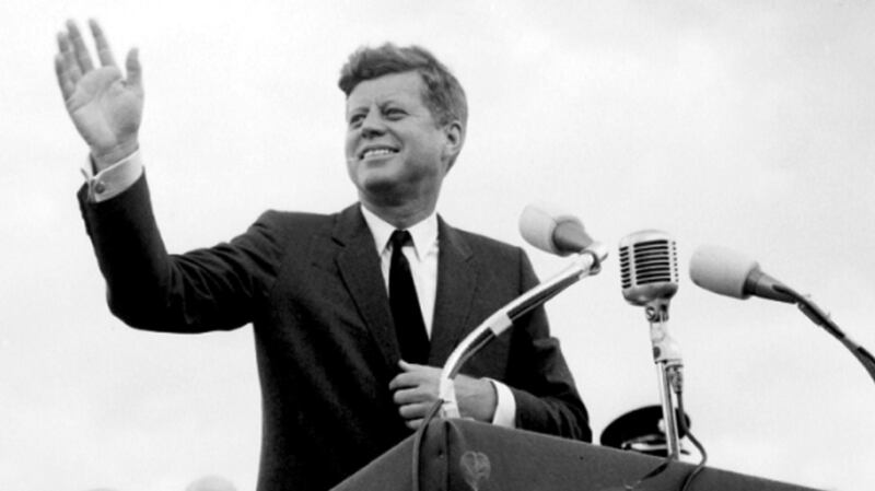 President John F Kennedy acknowledging the cheers as he visits New Ross, Co Wexford, in 1963. Photograph:  PA Wire