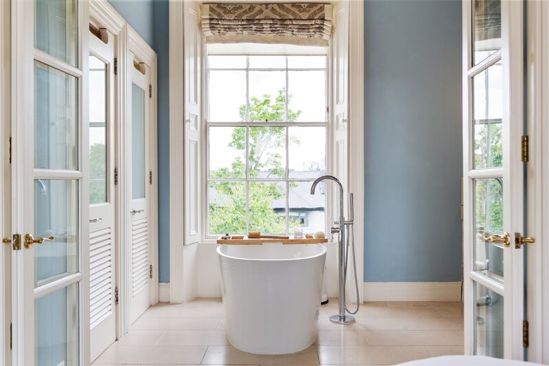 Both shower and loo are hidden behind separate doors in the principal en-suite bathroom