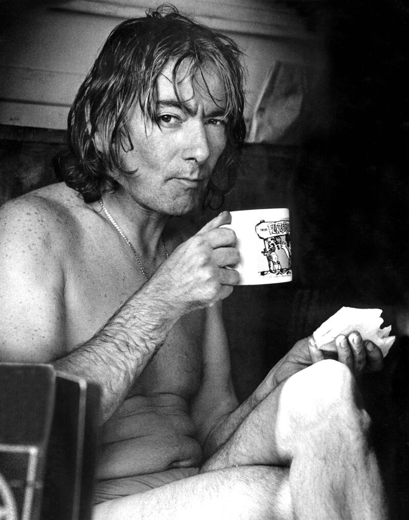Joey Dunlop after a hard day’s racing at the 1993 Carrowdore 100 races in Northern Ireland.  Photograph: Stephen Davison


