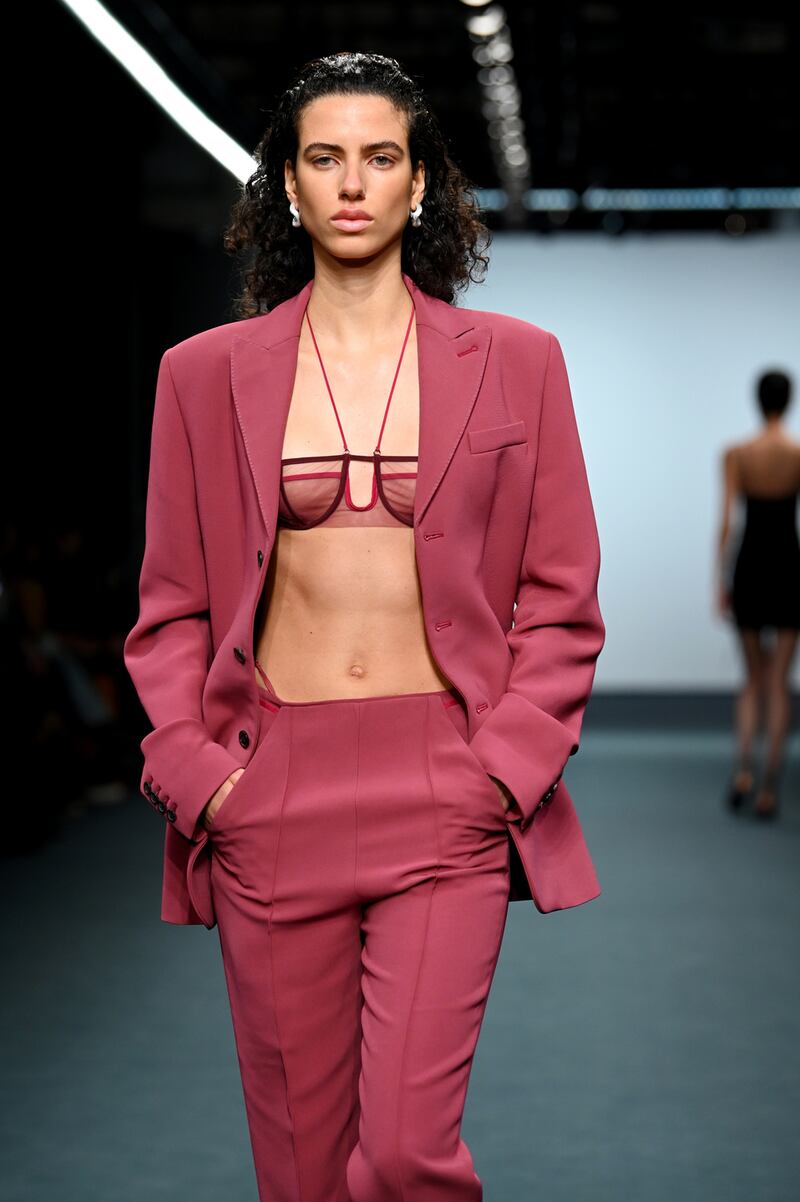 A model walks the runway at the Nensi Dojaka show during London Fashion Week 2022. Photograph:  Joe Maher/BFC/Getty Images for BFC
