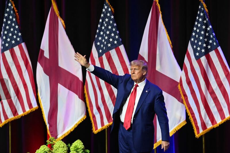 Donald Trump waves to the crowd during the Alabama Republican Party’s 2023 Summer meeting on August 4th, the day after he was arraigned on federal charges in Washington, DC for his alleged efforts to overturn the 2020 election. Photograph: Julie Bennett/Getty Images