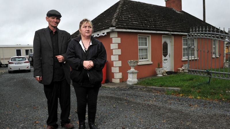 Parents Thomas and Helen O’Driscoll  outside the house  in Charleville, Co Cork where their twin boys Patrick and Thomas were killed. Photograph:  Daragh Mc Sweeney/Provision