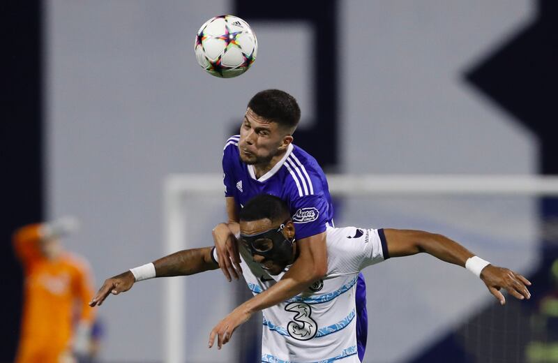 Dino Peric of Dinamo  Zagreb challenges Pierre-Emerick Aubameyang of Chelsea during the Champions League match in Zagreb. Photograph:  Antonio Bat/EPA/EFE