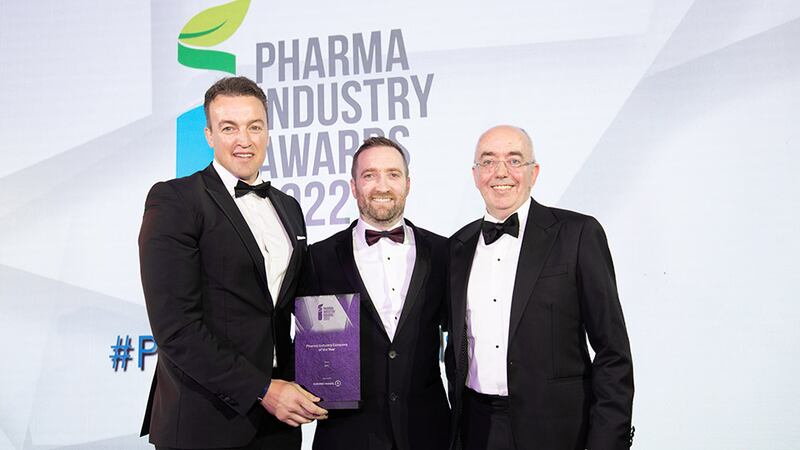 Seamus Keane, Industry Champion – Healthcare, Kuehne+Nagel, presents the Pharma Industry Company of the Year award to Mark Barrett and Brian Glennon, APC.