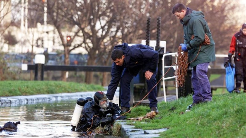 Garda divers searching the Grand Canal for Trevor Deely in 2000. Photograph: Colin Keegan/Collins
