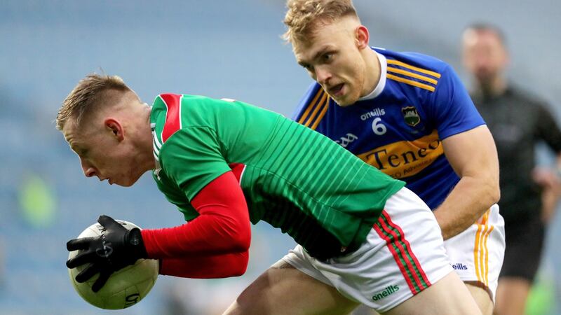 Mayo’s Ryan O’Donoghue and Kevin Fahey of Tipperary in the  All-Ireland SFC semi-final at Croke Park on December 6th. Photograph: Bryan Keane/Inpho