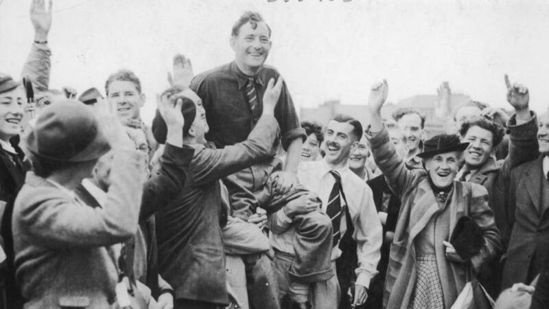 Fred Daly celebrates after winning the Open Championship in 1947. Photo: Getty Images