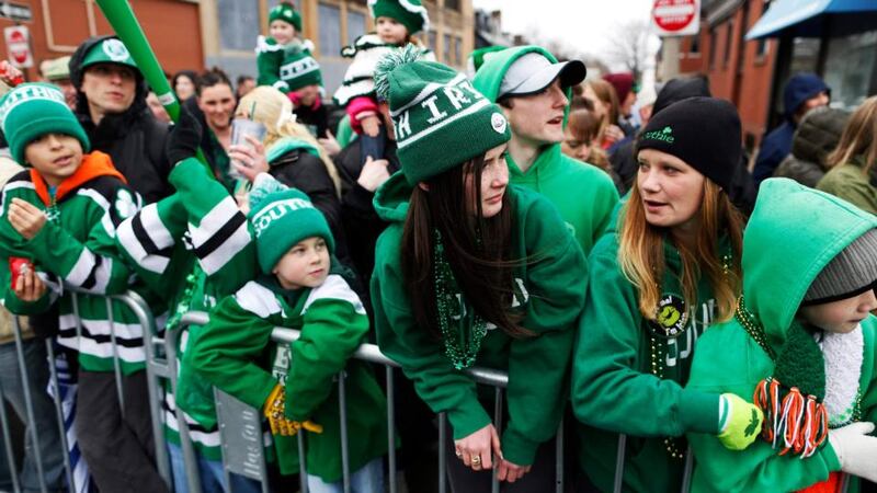 Spectators watch the St. Patrick’s Day Parade move down Broadway in South Boston, Massachusetts March 15, 2015. Photograph: Dominick Reuter/Reuters