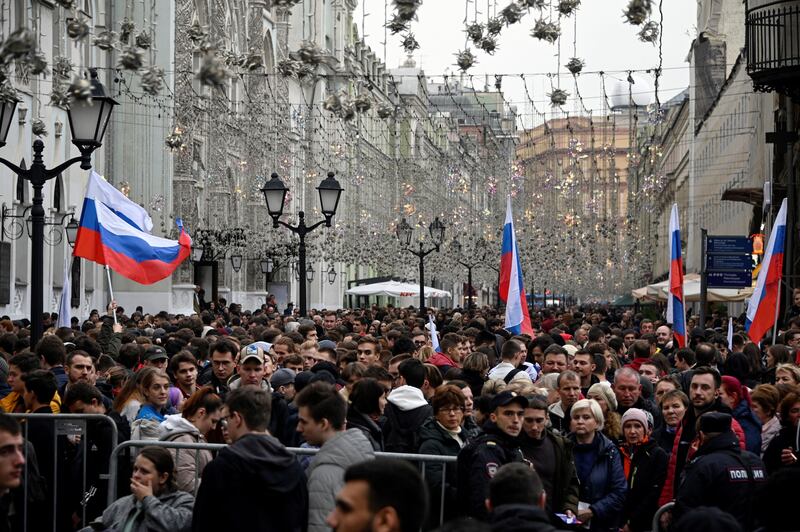 People gather in central Moscow ahead of a rally and a concert marking the annexation of four regions of Ukraine Russian troops occupy. Photograph: Alexander Nemenov/AFP