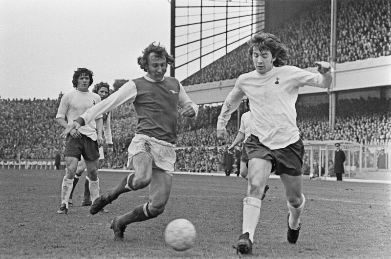 Bob McNab of Arsenal FC and Joe Kinnear (right) of Tottenham Hotspur during a Division One match at Highbury in April 1973. Photograph: Evening Standard/Hulton Archive/Getty Images
