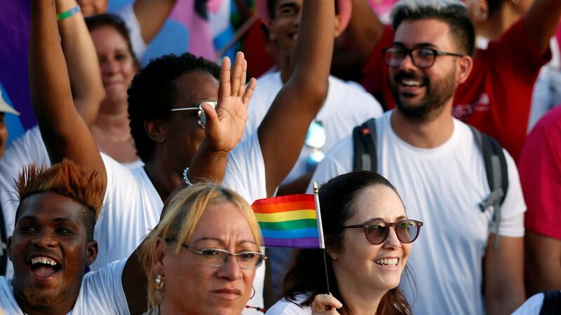 Mariela Castro (at front right with dark glasses),  daughter  of Communist Party leader Raul Castro, at a parade to commemorate  Labor Day in Havana, Cuba,  May 1st, 2019. Photograph: Ernesto Mastrascusa/EPA