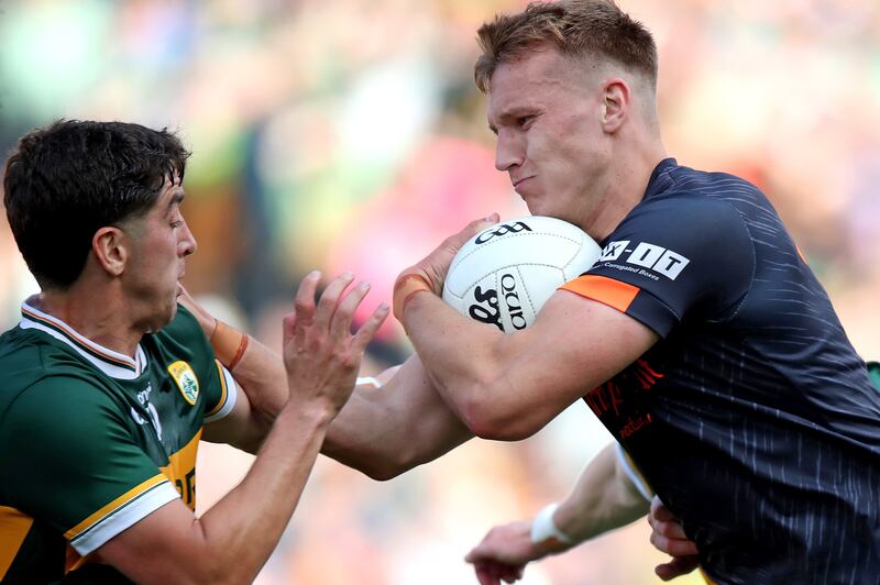 Kerry’s Tony Brosnan tackles Rian O'Neill of Armagh. Photograph: Leah Scholes/Inpho