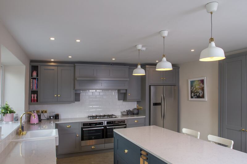 The kitchen overlooks the garden, a massive expanse of green that is 50 metres long and has vehicular rear access. Photograph: Paul Tierney