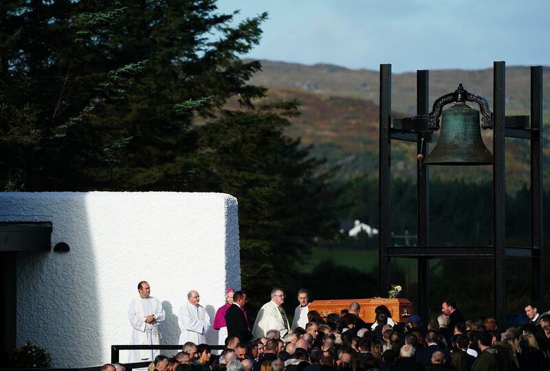The coffin of Hugh Kelly arrives at St Michael's Church, in Creeslough. Photograph: Brian Lawless/PA