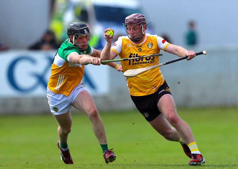 Offaly's Cathal King tackles Antrim's Eoghan Campbell. Photograph: Leah Scholes/Inpho