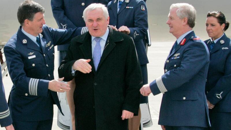 Lisa Smith on the extreme right of picture as then taoiseach Bertie Ahern thanks members of the Aer Corps before boarding the Government jet in 2008. Photograph: Collins Dublin