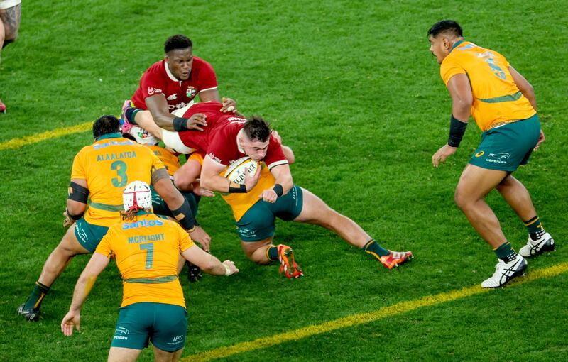 Dan Sheehan goes aerial to score the Lions' first try against Australia. Photograph: James Crombie/Inpho
