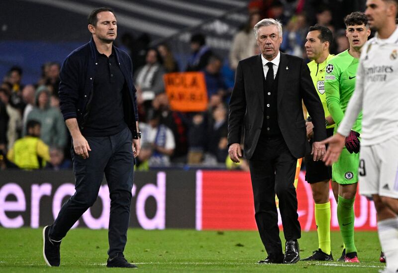 Frank Lampard, Chelsea's third manager of the season, and Real Madrid's ex-Chelsea manager Carlo Ancelotti leave after Real's comfortable win. Photograph: Javier Soriano/AFP via Getty Images