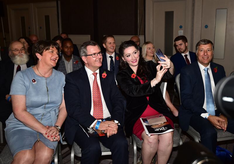DUP leader Arlene Foster (left), Sir Jeffrey Donaldson MP and Emma Little-Pengelly MP pose for a selfie at the annual party conference in Belfast on Saturday. Photograph: Colm Lenaghan/Pacemaker
