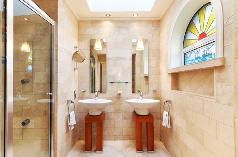 A shower room beside the utility room has Villeroy & Boch sanitary ware. 