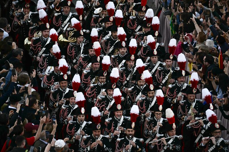 Carabinieri take position on the parvis of St Peter's basilica before the first appearance of the new pope. Photograph: Filippo Monteforte/AFP via Getty Images