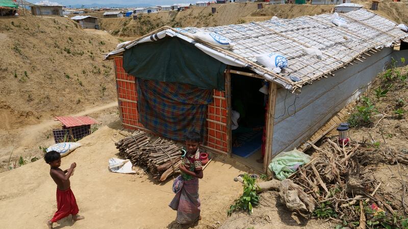 Rohingya refugees use bamboo poles and rope to construct bridges and fortify shelters during monsoon season. Photograph: Kathleen Harris