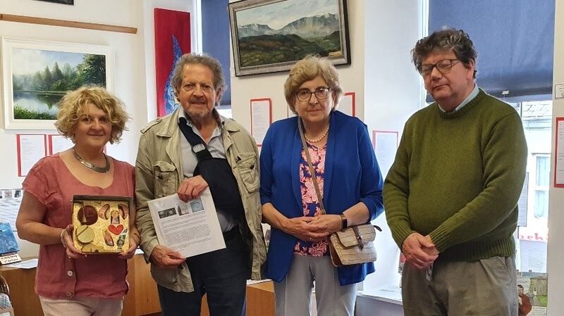Eithne and Gay Brazel, Laura’s parents, with her aunt Marie O’Connor and artist John Davies. Eithne is holding the original art legacy piece.