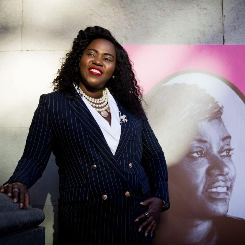 Ellie Kisyombe with a portrait of her made for Dublin City Council Culture Company’s Local Heroes project. Photograph: Tom Honan