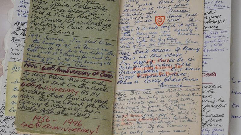 The Christmas card, with extra inserts, which has been sent between the friends since 1956. Photograph: Bryan O’Brien/The Irish Times