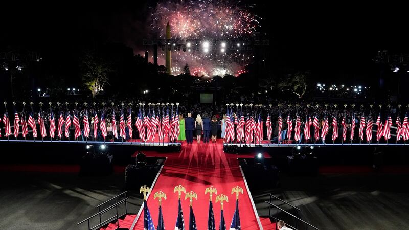 A fireworks display goes off behind the Washington Monument as president Donald Trump is joined on stage by his family during the final night of the Republican National Convention. Photograph: New York Times