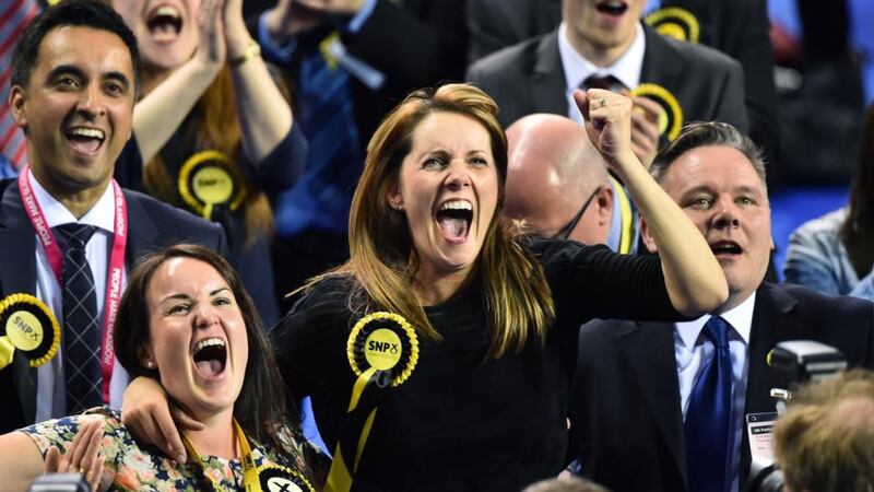 SNP supporters celebrate during the Glasgow result declarations on May 8th, 2015 in Glasgow, Scotland. Photograph: Jeff J Mitchell/Getty Images